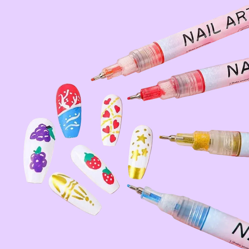 Nail art pens with decorative nail designs on a pink background